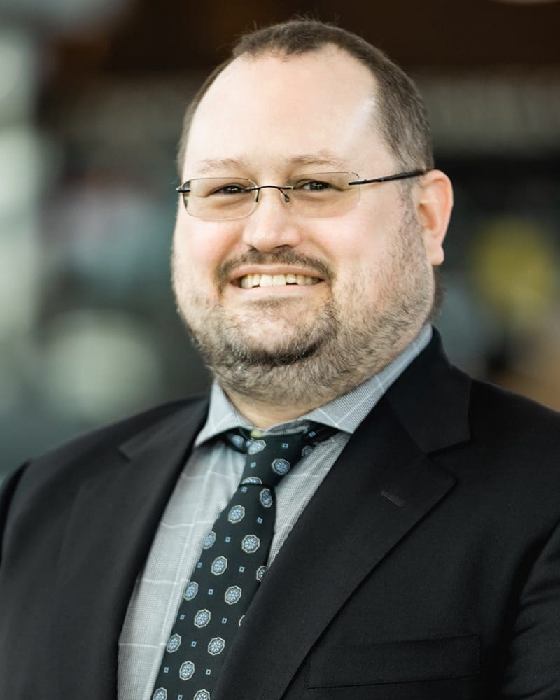 Practus Paralegal, Todd Yoho