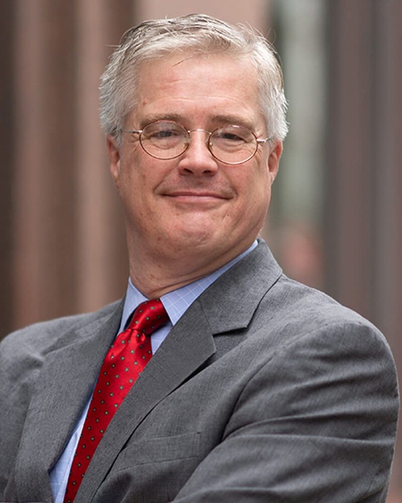 terry dixon partner of practus headshot with glasses on