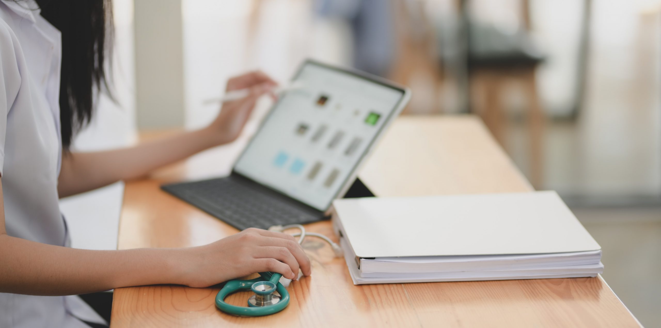 laptop computer open with medical healthcare law webinar
